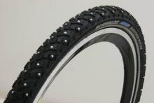 A Schwalbe Marathon Winter tire -- 240 studs on each, and I wouldn't go without them.
